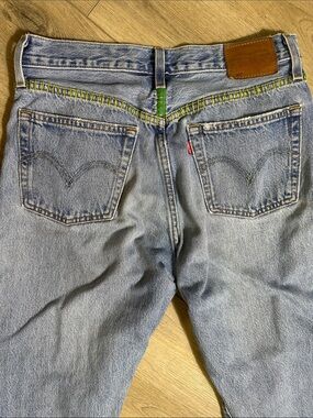 Fun custom embroidery adorned Levi 501 worn jeans. 28 x 28